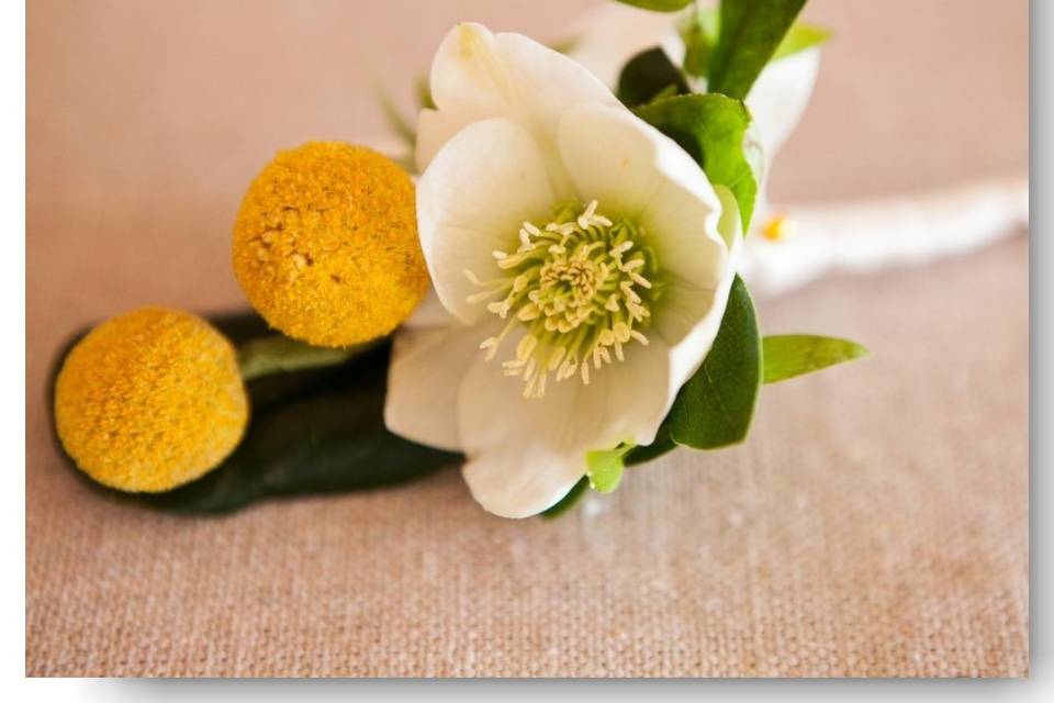 Yellow and white boutonnières