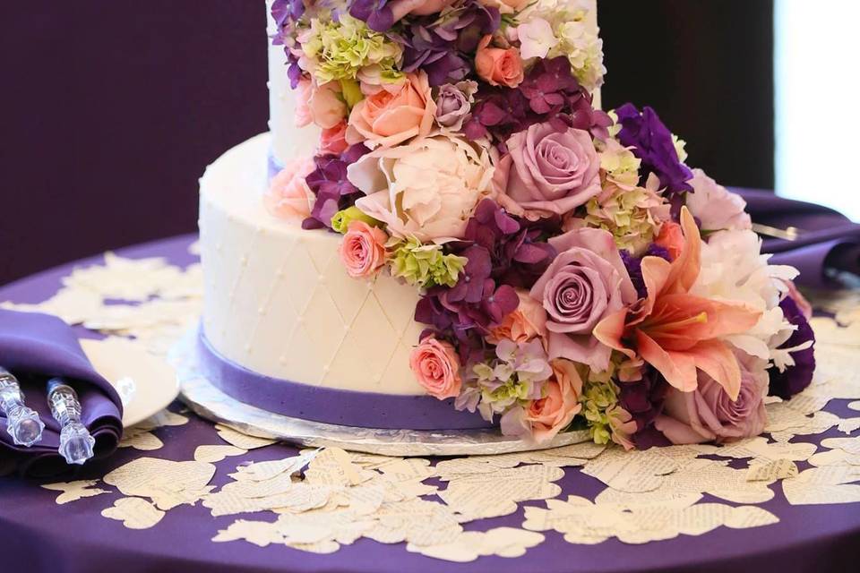 Lush cascading cake florals