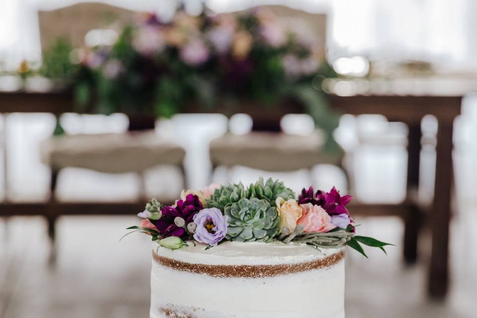 Naked cake with flower accents