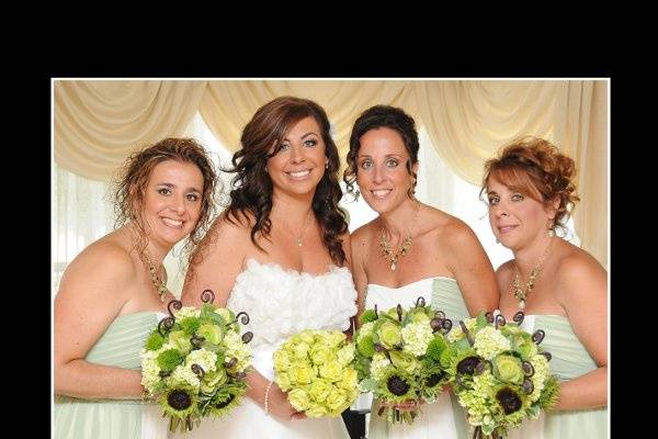 The beautiful bride & her sisters.  We love working with your family.  All of the sisters had a different style & we have been honored to design for all of them.  Thanks ladies!!!