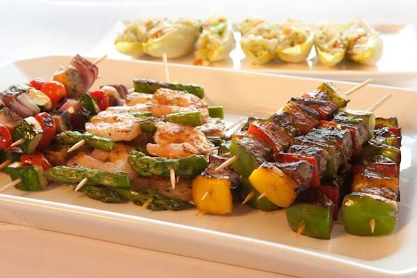 Chicken Balsamico Skewers -- seasoned in freshly minced Tuscan herbs & drizzled w/honey balsamic reductionBistecca Toscano Skewers -- marinated in freshly minced Tuscan herbs, w/red & yellow peppersEndive boats filled w/our signature Tuscan Caesar salad