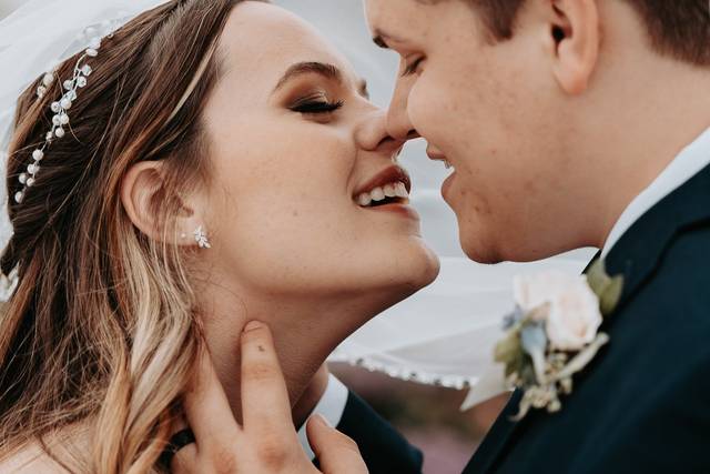 Leaning in for a kiss.