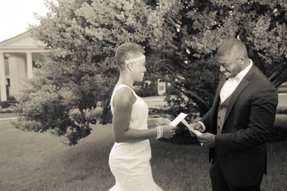 Newlyweds reading their vows