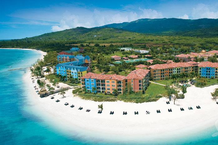 Sandals Whitehouse, Jamaica: European village and spa with two mile beach - voted World's best by Travel Leisure and Conde Nast Traveler! Features: all oceanfront rooms and suites, three European-inspired villages, unlimited gourmet dining at 7 restaurants, and more!