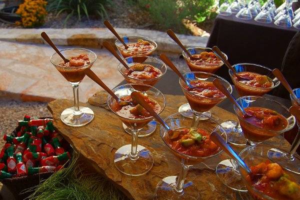 Creative presentation of Bruschetta Toppings and Cheese & Fruit Display.