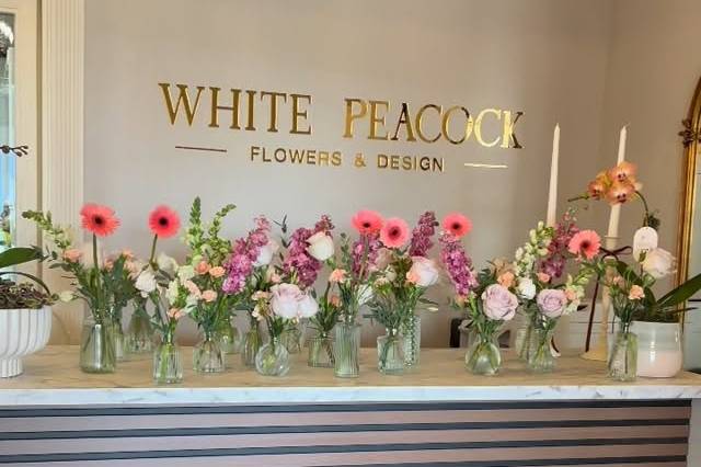 White Peacock Flowers & Design