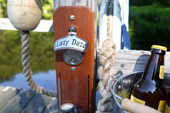 The Capcatcher Bottle Opener is the ideal gift for any beer lover, especially one who enjoys drinking beer outside. This Stainless Steel Bottle Opener with Mahogany backing is weather resistant and perfect for boats, decks, patios and outdoor kitchens. Makes a great Groomsmen Gift, Father's Day Gift, Christmas Gift, Anniversary Gift, or House Warming Gift.