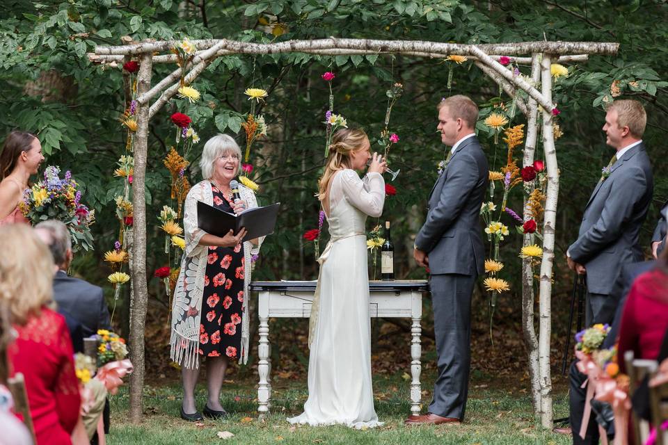 Rustic florals and pergola