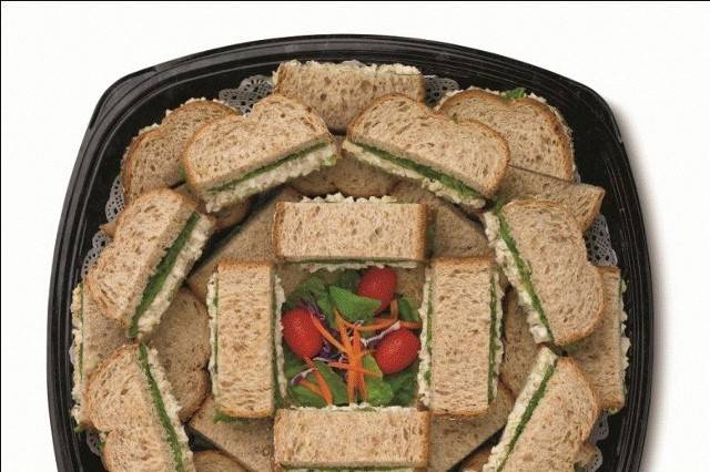 Chick-fil-A Chicken Salad Sandwich TrayMade with the freshest ingredients, which include chunks of our Chick-fil-A chicken breast, chopped eggs, celery, sweet pickle relish and mayonnaise, served chilled with Green Leaf lettuce on wheatberry bread.