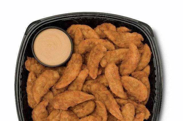 Chick-fil-A Chick-n-Strips TrayMade from the most tender part of the chicken breast, marinated with special seasonings and served with your choice of dipping sauces.  Purchase this tray hot and ready to serve, or cooked and chilled to be reheated later.  Ask for details.