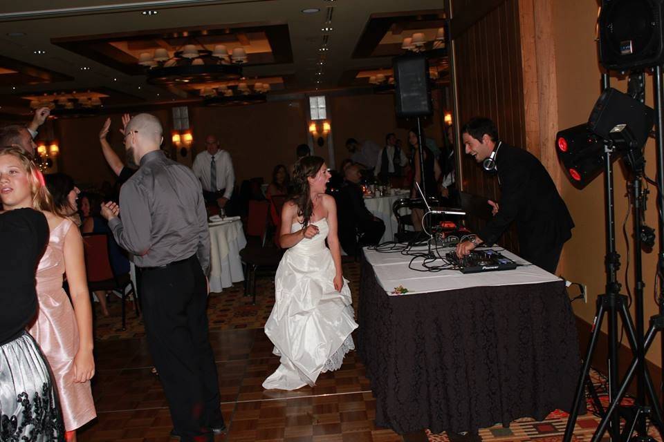 The bride dancing with guests