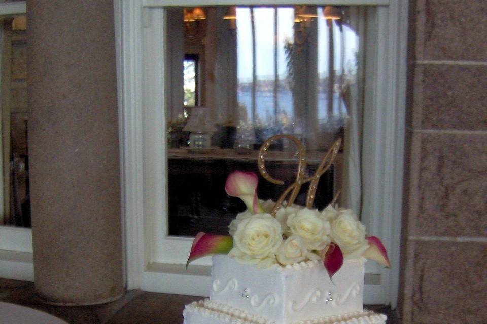 All white square wedding cake