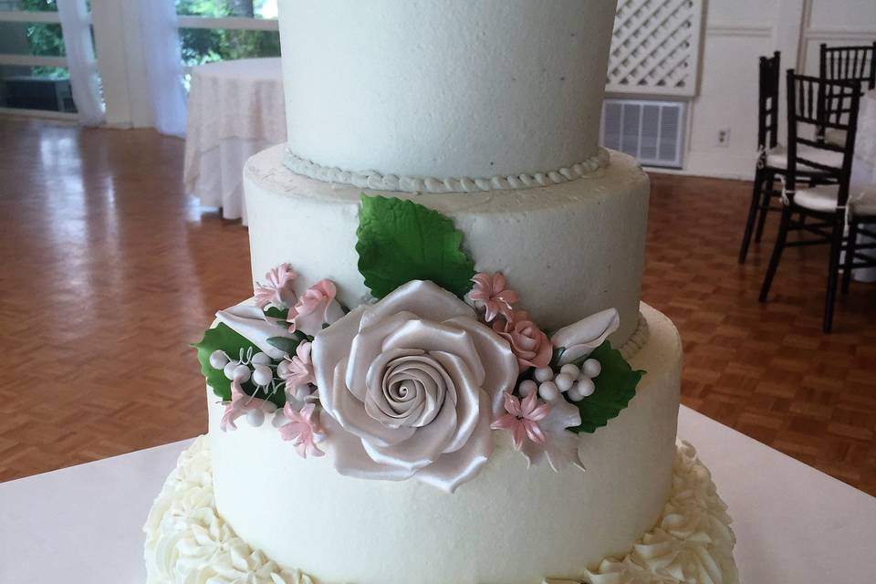 Ruffled rose wedding cake