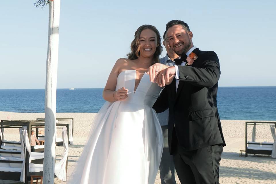 Newlyweds by the ocean