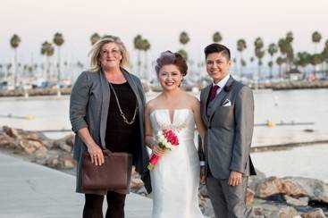 Newlyweds with officiant