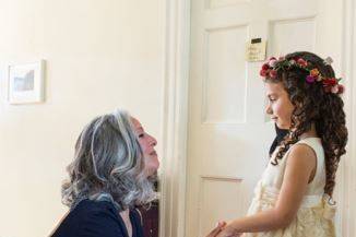 The officiant with the flower girl