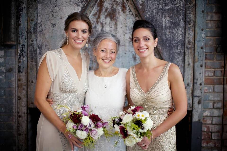 Couple with the officiant