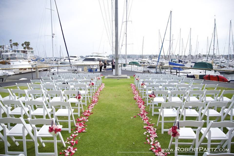It was such a joy to be a part of Heidi and Kevin's wedding at California Yacht Club in Marina Del Rey! Heidi's choices were spot on, with a truly beautiful Nautical wedding Theme, mixing in bold pops of Pink. Big Thanks for the stunning work of Robert Paetz Photography!!