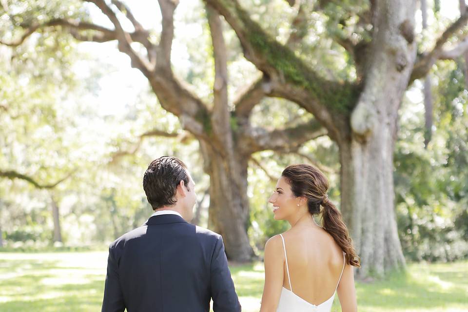 Newlyweds holding hands