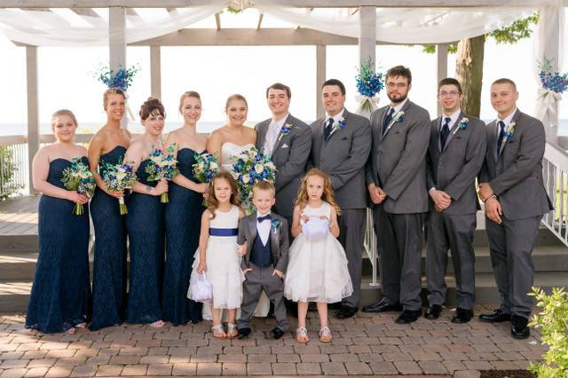 Putting on the groom's boutonniere