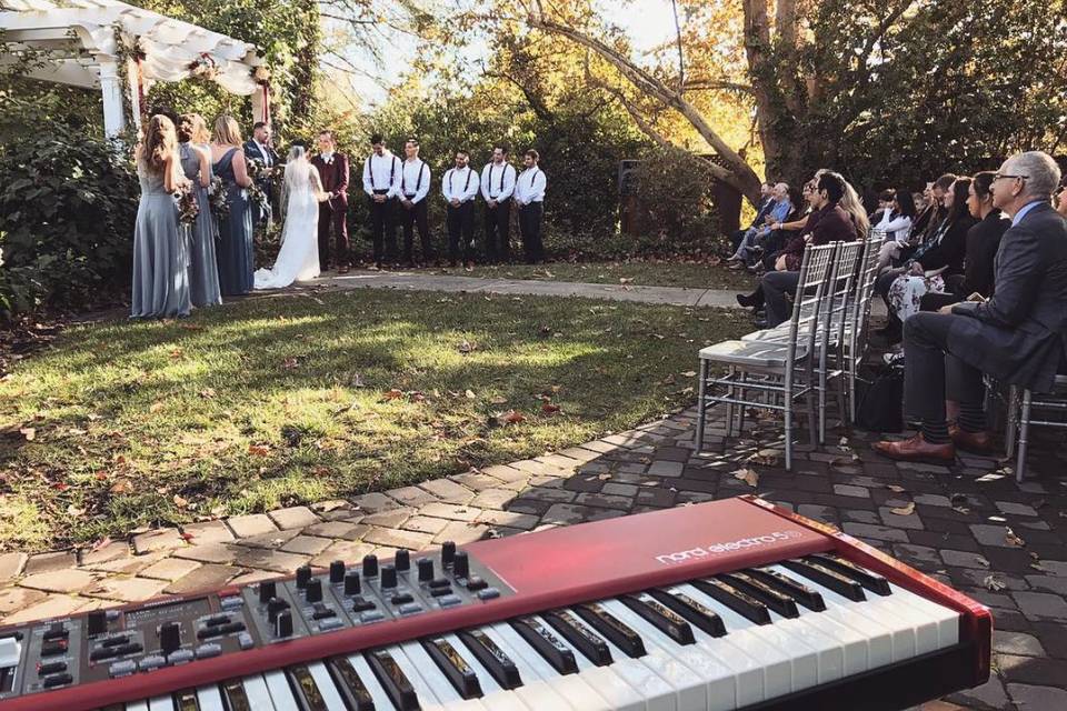 Piano setup at outdoor wedding