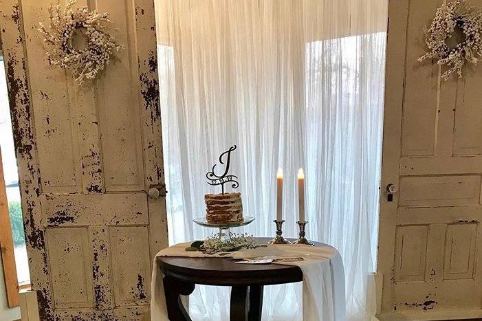 Cake table and vintage doors