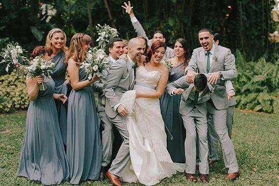 The couple with the bridesmaids and groomsmen