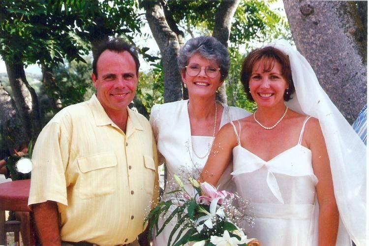 Newlyweds with the officiant