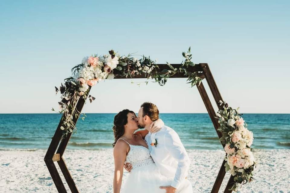 Hexagon wedding arch on beach