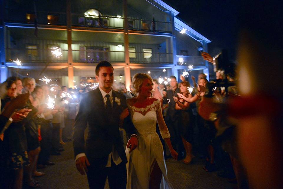 Newlywed couple sparkler exit