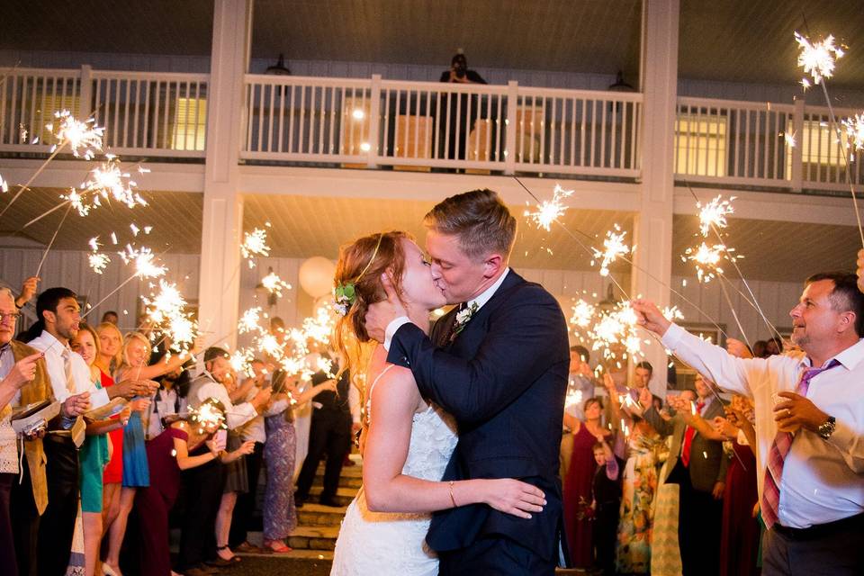 Newlywed couple sparkler exit