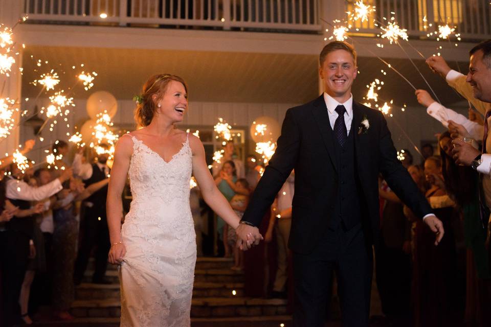 Newlywed couple sparkler exit