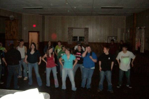 Some teenagers doing the macarena