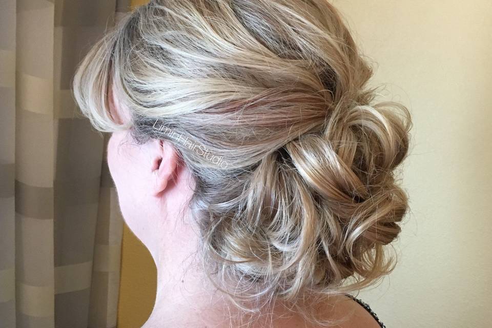 Curly low bun