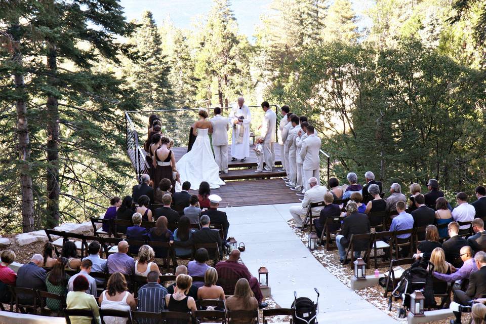 Wedding ceremony on extended decking overlooking Lake Arrowhead