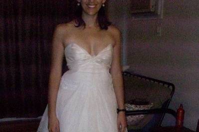 Happy bride after having her dress altered