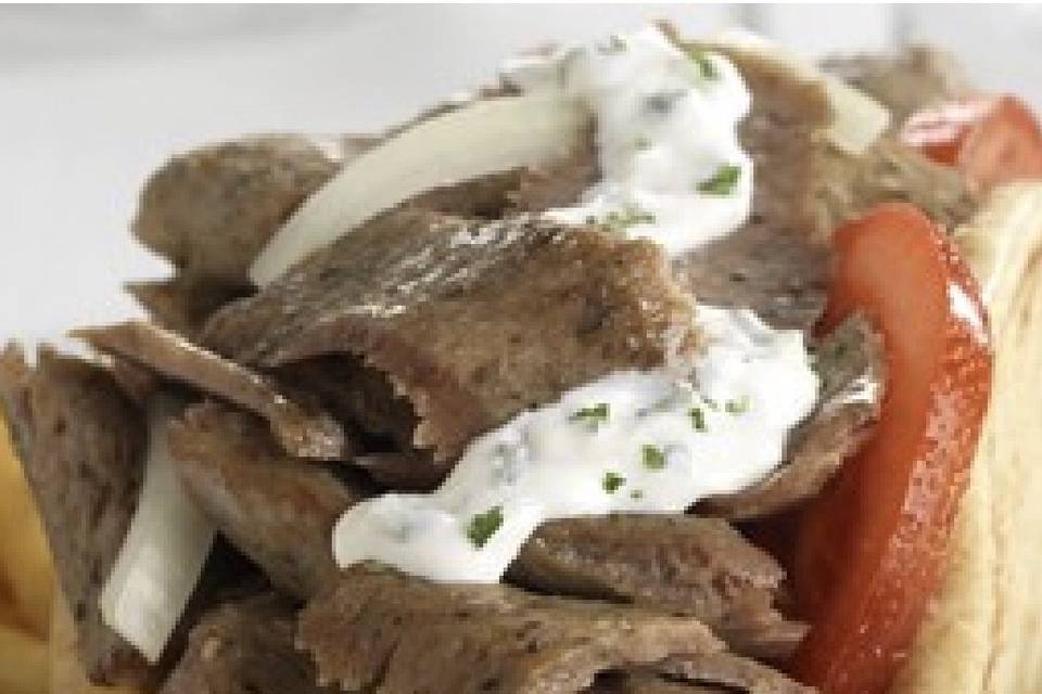 Our Famous Zues!! Gyro Meat, Fries , Veggies, Homemade Sauce On A Pita! We Have A Variety Of Sauces Of All Different Flavors That Are Made The Same Way!