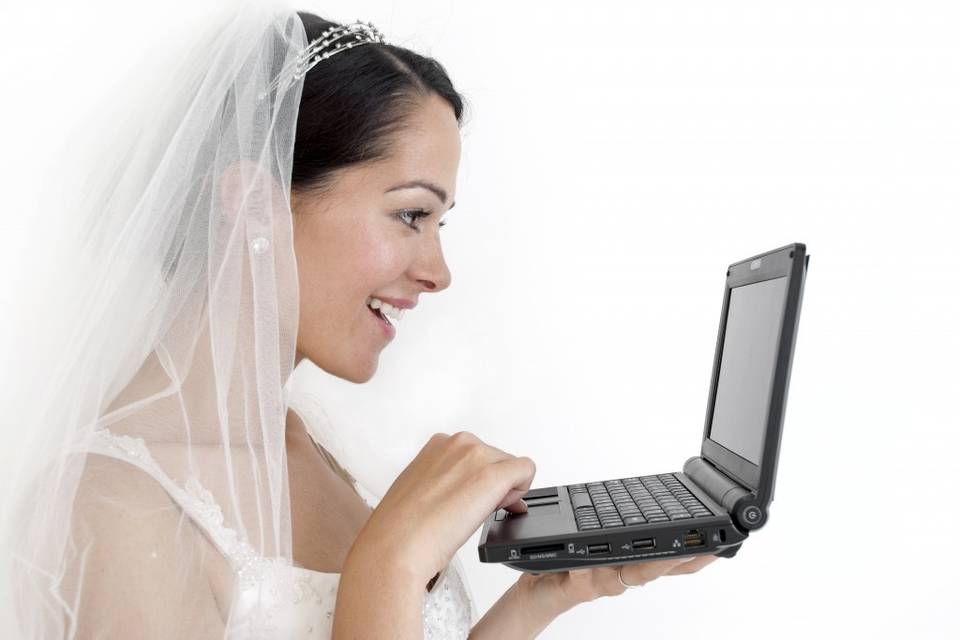Bride viewing laptop