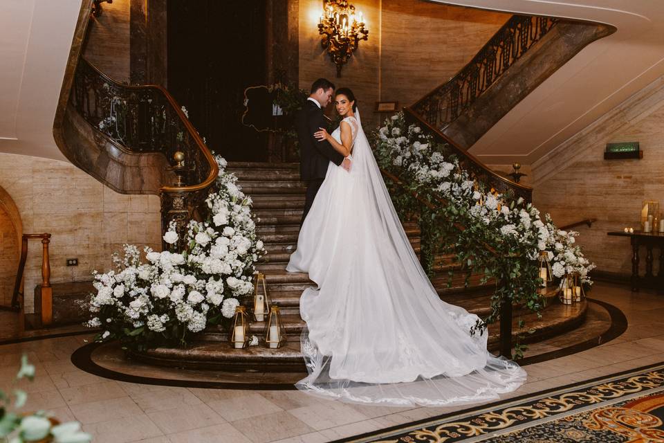 Couple on the ballroom foyer staircase