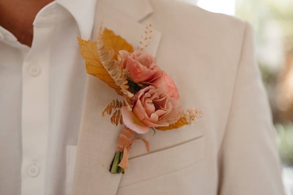 Mauve and peach boutonniere