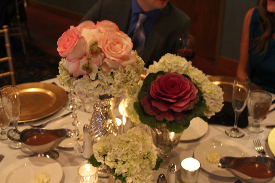 Centerpieces with mercury glass at Fox Hill Golf and Country Club