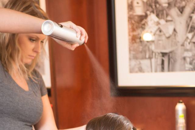 Finishing touches on the hair | Photo by Mike Curtis Weddings