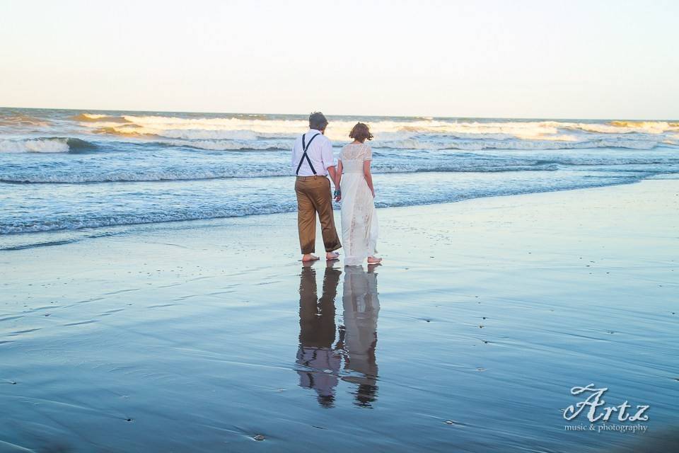 Couple walking along the beach