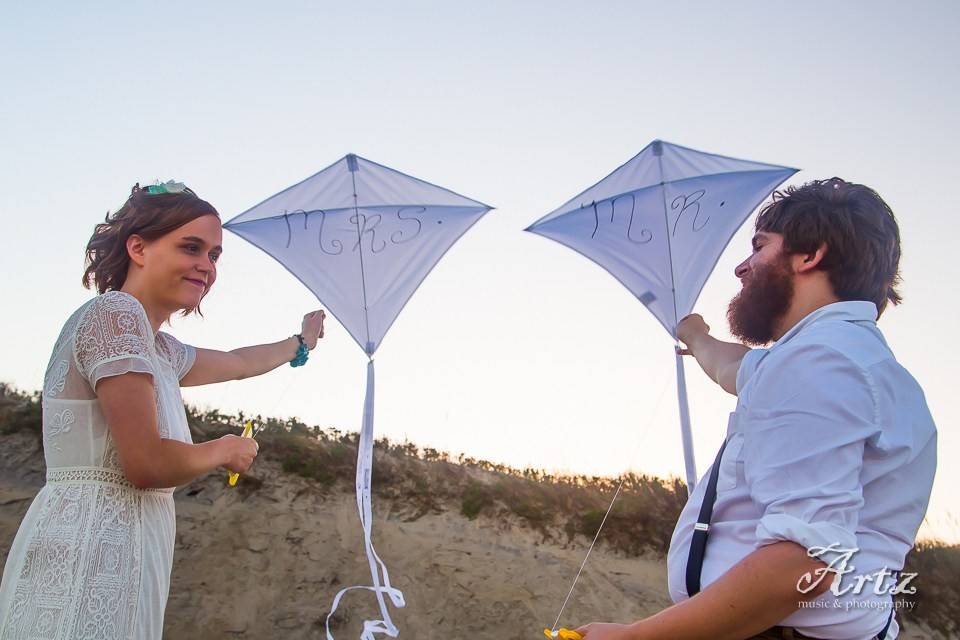 Couple fly kites