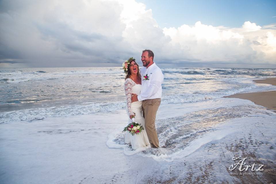 Couple hit by the waves