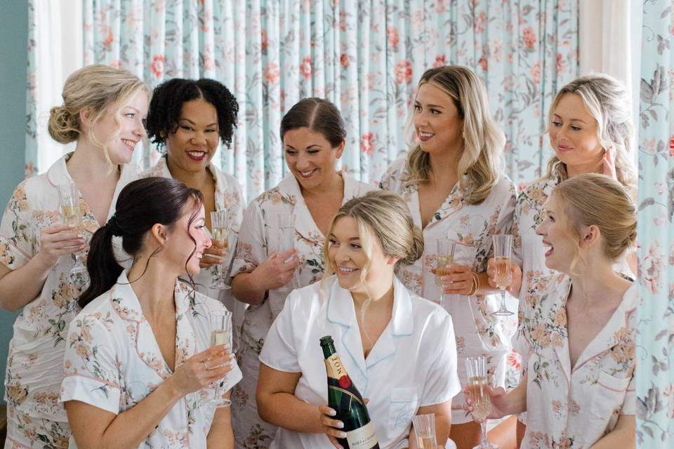 Brittland bridal party on bed