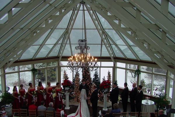 Winter Wedding Ceremony in Glass AtriumSpringwood Manor