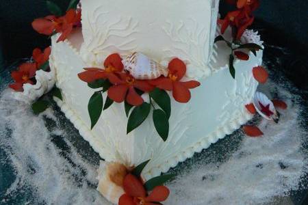 Small cake with beach theme and orchids