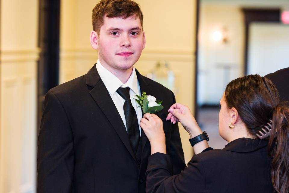 Helping the groom get ready
