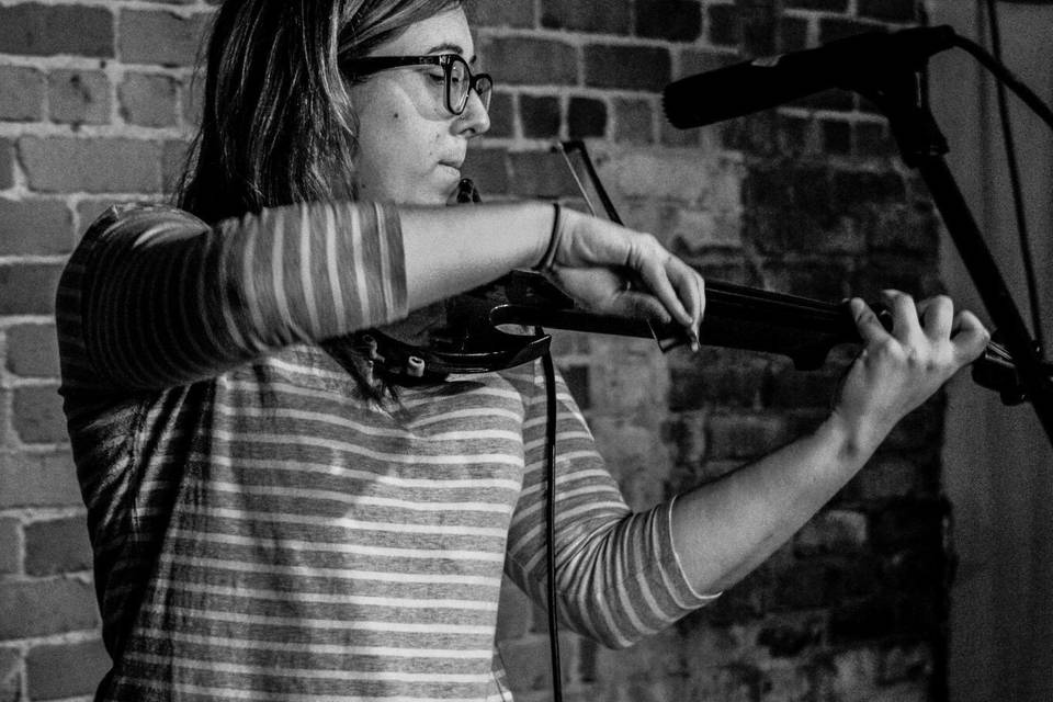 Action shot playing violin
